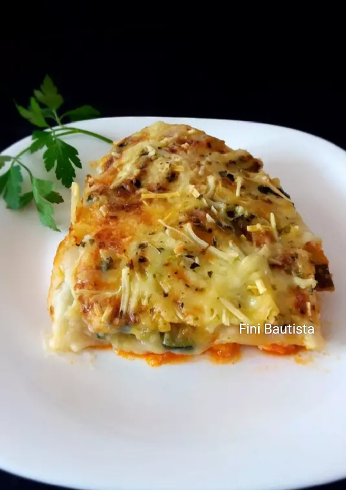 Una foto de Lasaña de calabacín y pollo con bechamel de coliflor