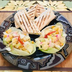 Baffulo wraps with healthy salad A picture of Baffulo wraps with healthy salad.