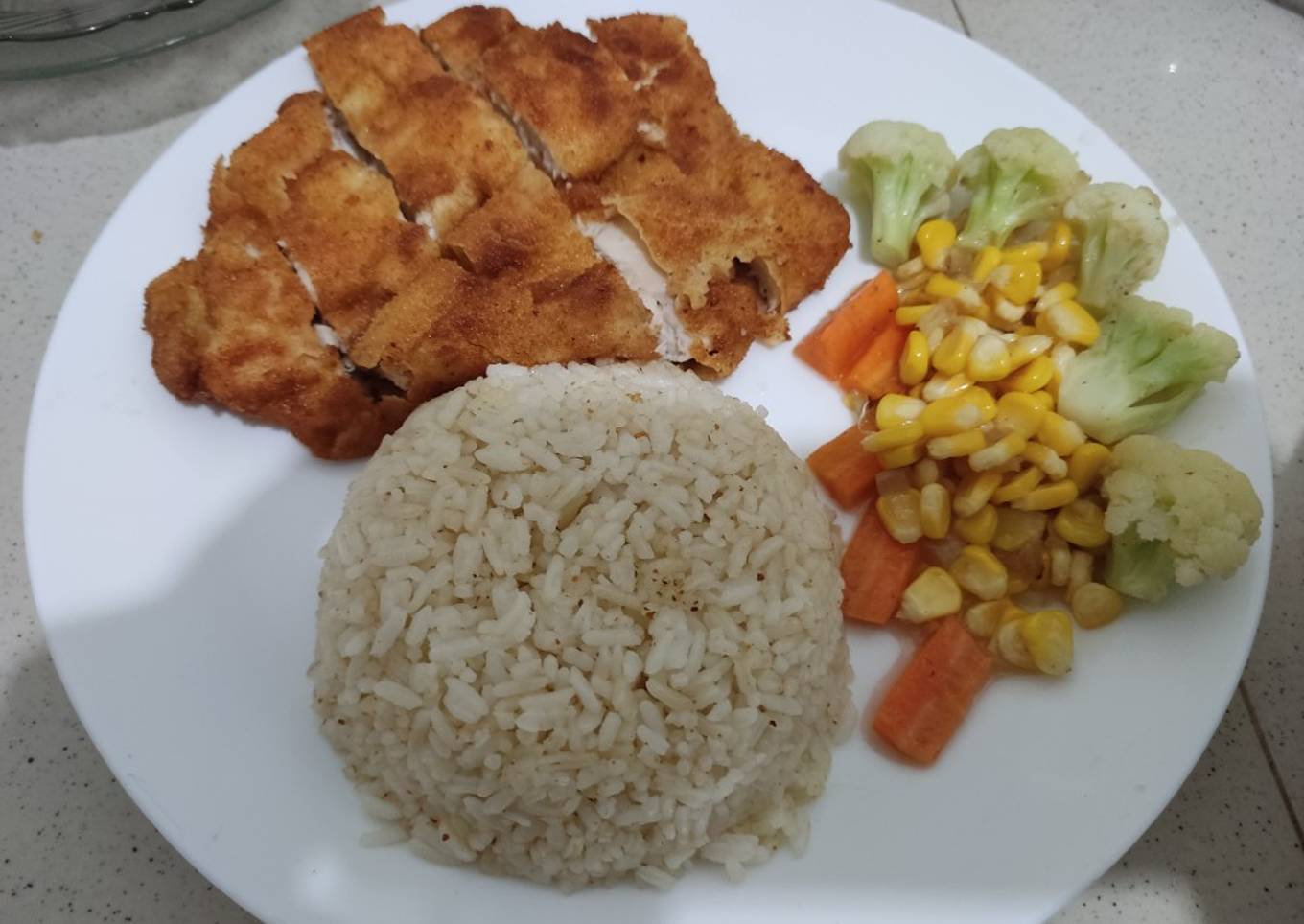 Chicken Schnitzel with spicy buttered rice