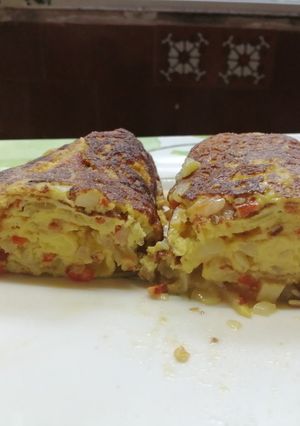 Una foto de Roll de huevos y cebolla