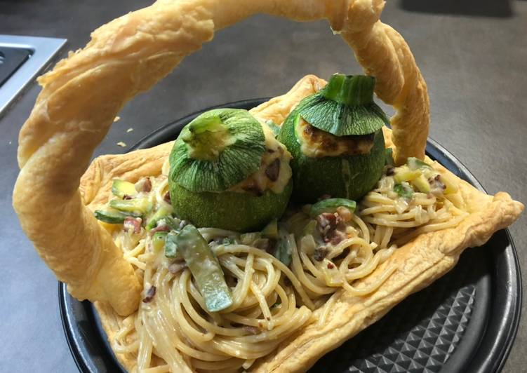 Finto cestino di Pasqua con nidi di spaghetti e uova di zucchine tonde ripiene