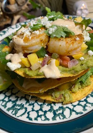 A picture of 3 Layer Stacked Shrimp Toastsda w/ Chipotle Sour Cream.