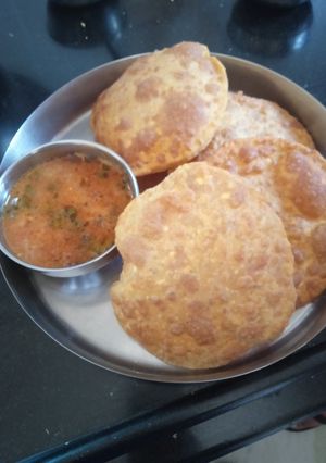 A picture of Radha Rani (Bedmi Puri) and Sabzi.