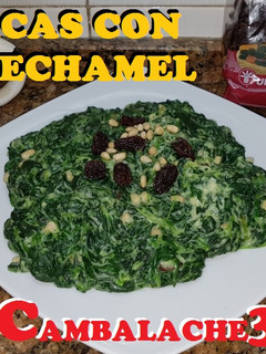 Una foto de Espinacas con salsa bechamel pasas y piñones