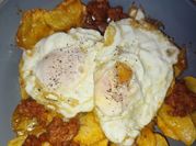 Una foto de papa con chorizo