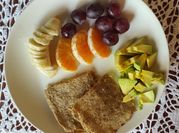 Una foto de tostadas con aceite y orégano