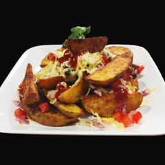A picture of Cheesy potato wedges.