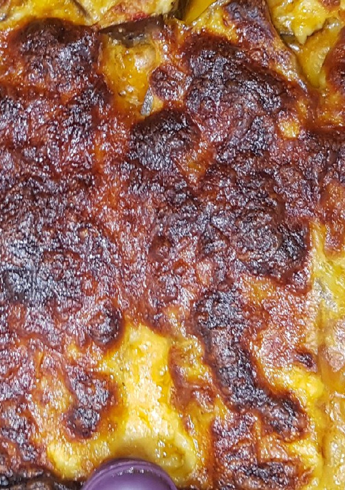 Una foto de Berenjenas rellenas de Verduras al horno!!🍆