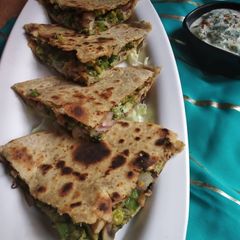 A picture of Broccoli cheese quesadilla.