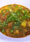 Spanish bean soup with smoked sausage and potato