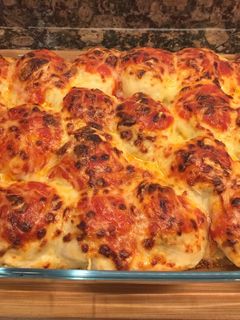 Una foto de Huevos rellenos de carne, gratinados con bechamel