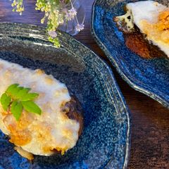 A picture of Roasted Eggplant with Miso and Cheese.