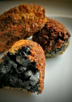 Una foto de Croquetas de Sepia en su tinta