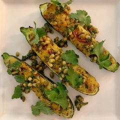Stuffed courgettes with pine nut salsa A picture of Stuffed courgettes with pine nut salsa.
