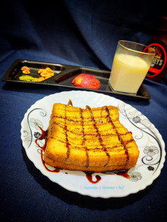 A picture of Eggless French Toast with fruit, nuts and milk.