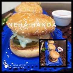 A picture of Bell pepper cheese stuffed burger.
