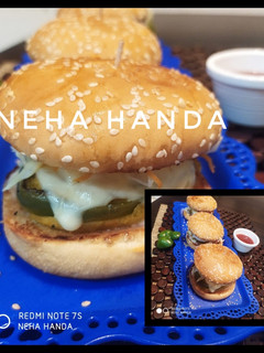 A picture of Bell pepper cheese stuffed burger.