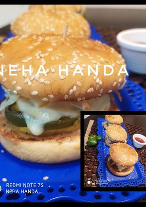 A picture of Bell pepper cheese stuffed burger.