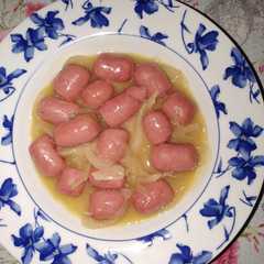 Una foto de Mini salchichas de pollo en salsa