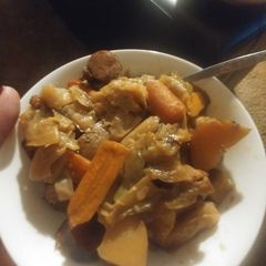 A picture of Slow cooker sausage,potatoes and carrots.