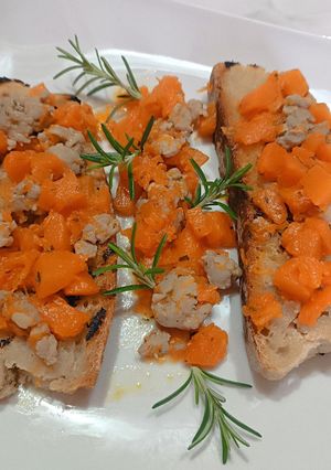 A picture of Toasted Bread with Butternut Squash and Sausage.