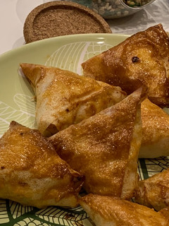 Une photo de Bricks poulet au curry