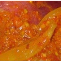 A picture of Onion pickleTasty and spicy pyaaj ke achaar .