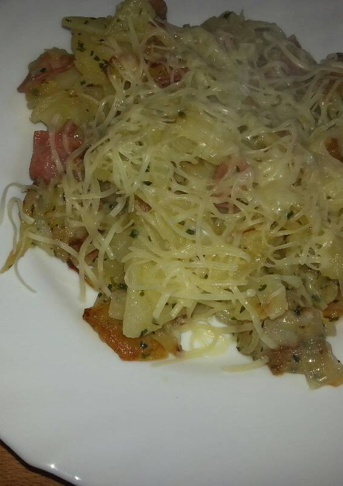Una foto de Patatas panaderas con queso y bacon