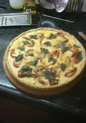 Una foto de Tarta de tomates asados y queso 💚