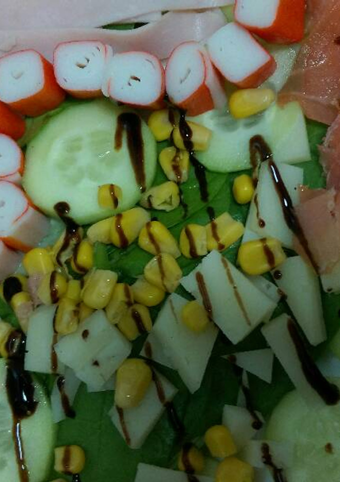 Una foto de Ensalada de espinacas y canonigos
