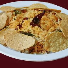 A picture of Ellu satham (ellorai in Tamil)-Rice cooked with sesame seed masala powder.