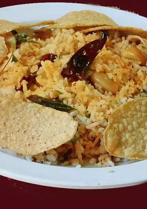 A picture of Ellu satham (ellorai in Tamil)-Rice cooked with sesame seed masala powder.