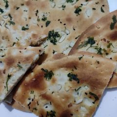 A picture of Garlic butter naan.