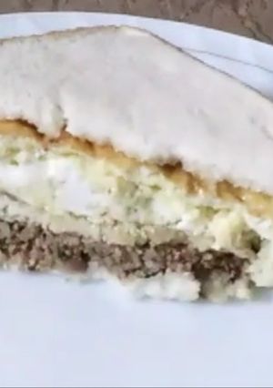A picture of Meat minced egg cheese sandwich.