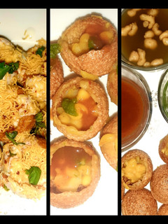 A picture of Indian snack (crisp sphere with flavoured water/curd mixture).