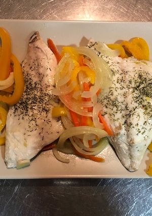 Una foto de Papillote de dorada al horno