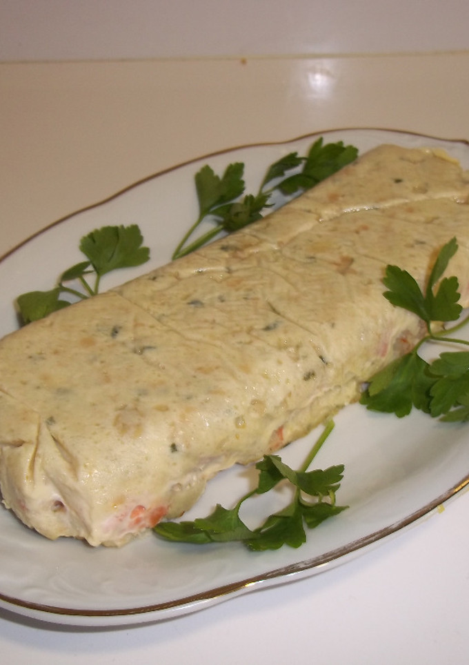 Una foto de Brazo de lenguado, salmón y gambas