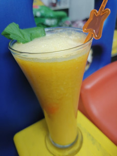 A picture of Orange Mango mint juice 🍋.