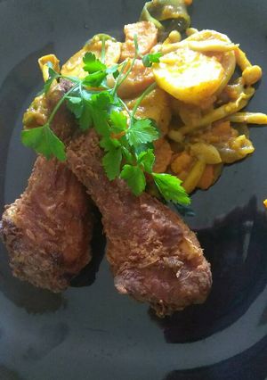 Una foto de Pollo rostizado con papá dulce