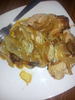 Una foto de Filetes de lomo de cerdo encebollados