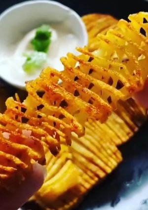 Una foto de Papas acordeón