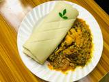 Egusi soup and rolled up pounded yam