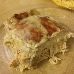 A picture of Green Sour Cream Chicken Enchilada Layers.