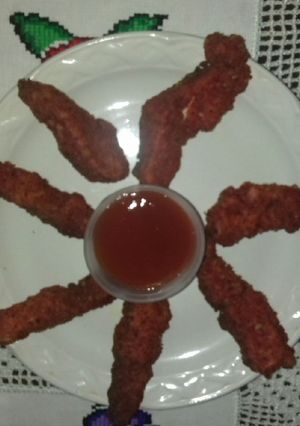 Una foto de Tiritas de pollo a la diabla