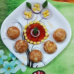 A picture of Cheese corn appam.