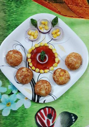 A picture of Cheese corn appam.