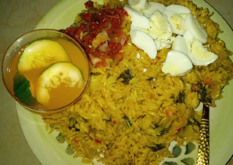 Step-by-Step Guide to Make Any-night-of-the-week Jollof rice macaroni boiled egg en sauce and mango juice