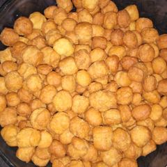 A picture of Crunchy mandazis in patco form.