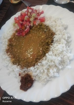 A picture of Coconut rice with creamy green grams.