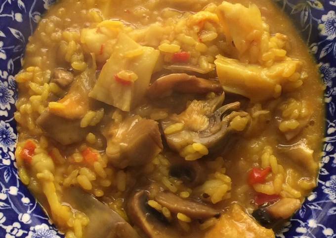 Arroz meloso con bacalao, gambones, alcachofas y champiñones Receta de Jose- Cookpad